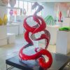 Red-Peel-Poem—150x90cm-STAINLESS-STEEL-&-BAKED-ENAMEL-[stainless-steel,-freestanding,-outdoor]-rae-bolotin-red-pop-art-sculpture-australian-art